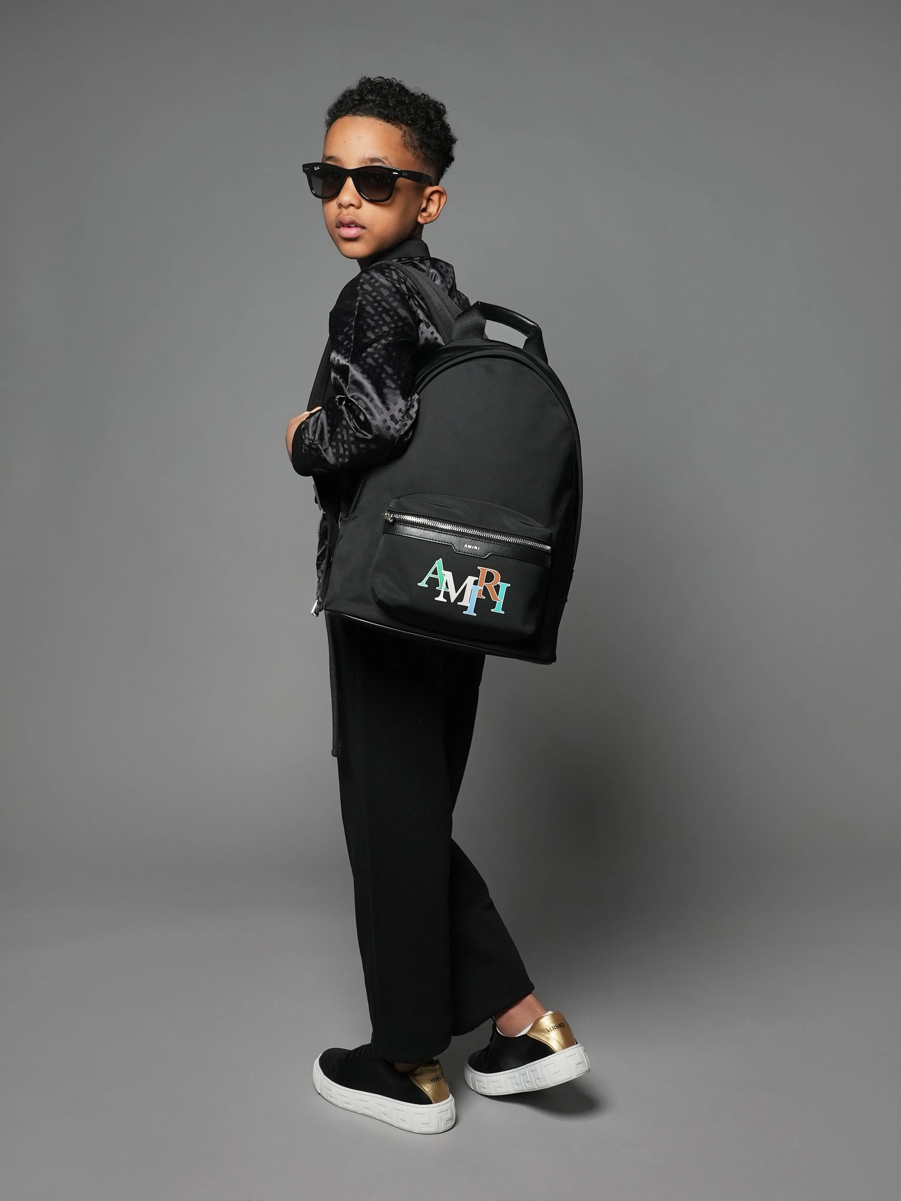 Amiri Kids Staggered Logo Backpack in Black (30cm)